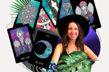 Smiling woman with hat in front of illustrated tarot cards and leaves.