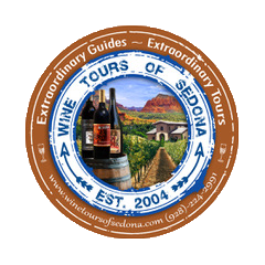 Round logo for Wine Tours of Sedona featuring wine bottles and a vineyard scene.